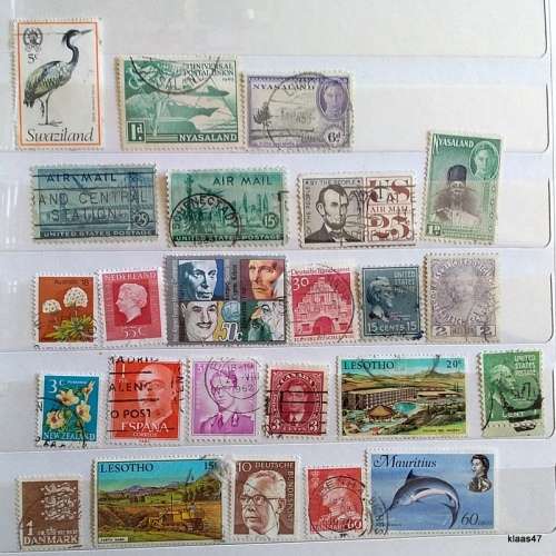 World Mix - Mixed lot of 24 Used (some hinged some still on paper) stamps