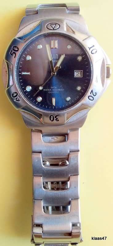 Win international - Men`s Watch - Quartz - 5ATM - Water Resistant - Stainless Steel (Working)