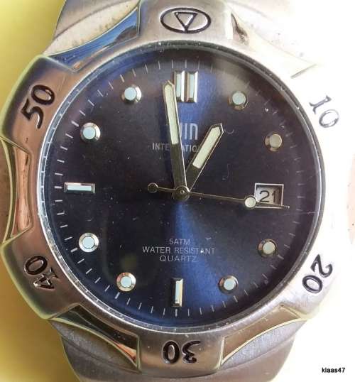 Win international - Men`s Watch - Quartz - 5ATM - Water Resistant - Stainless Steel (Working)