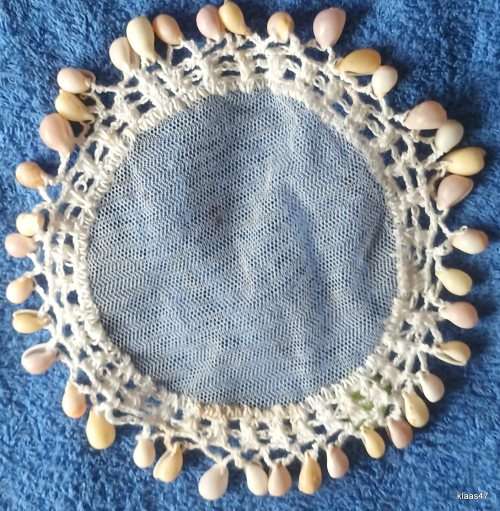 Net Jug Cover with crochet edge and Sea Shells