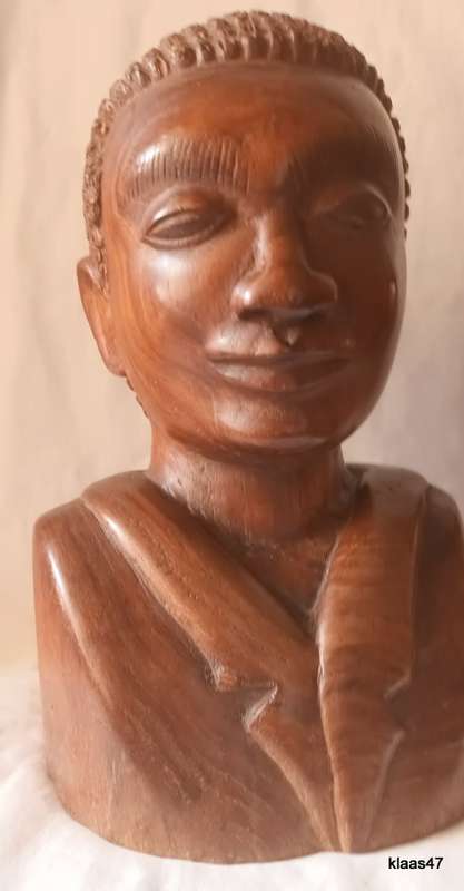 Carved African wooden bust