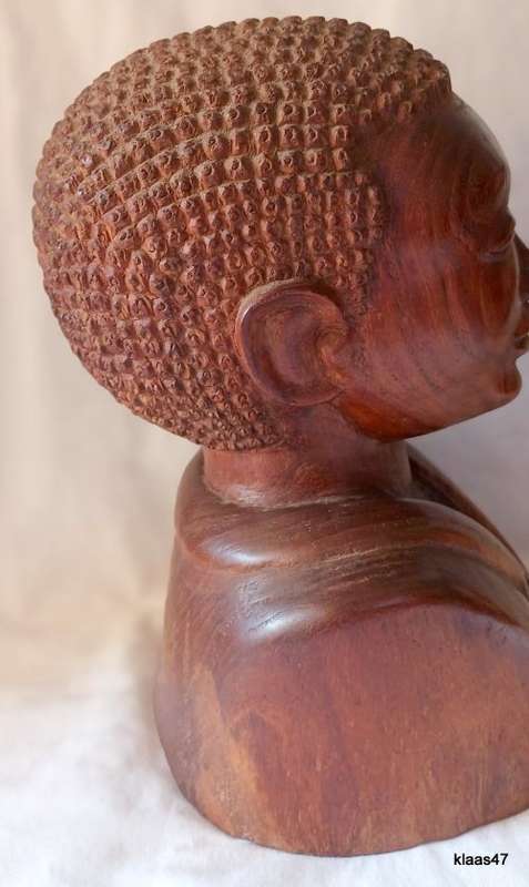 Carved African wooden bust