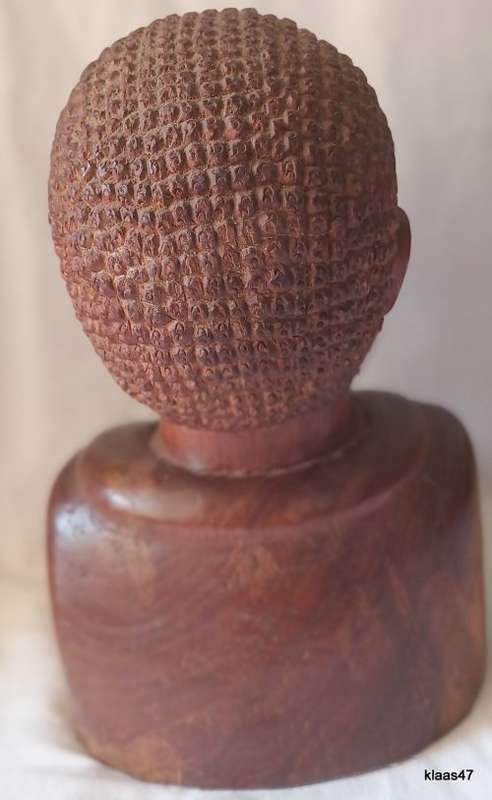 Carved African wooden bust