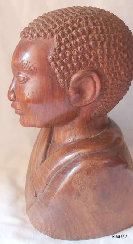 Carved African wooden bust