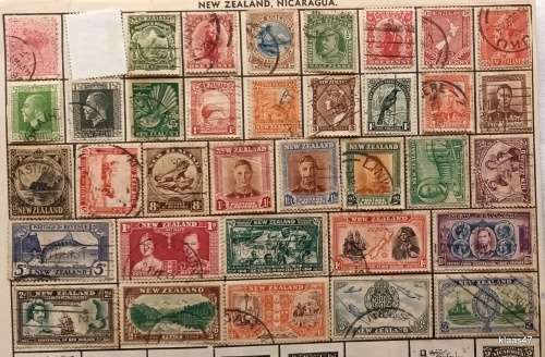 New Zealand - Album Page with 35 Used stamps (Hinge mounted)