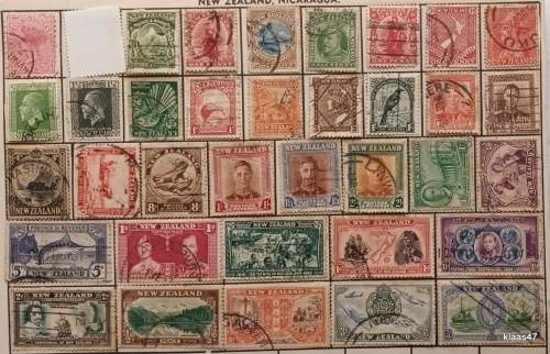 New Zealand - Album Page with 35 Used stamps (Hinge mounted)