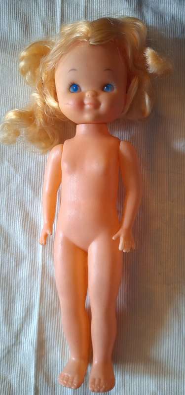 Doll with fixed legs