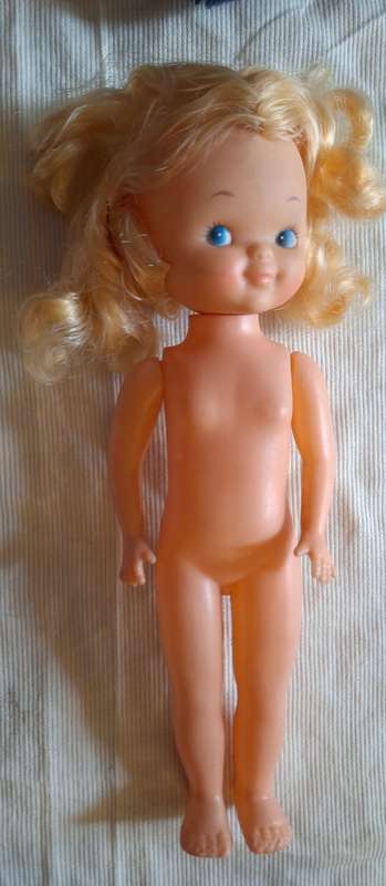 Doll with fixed legs