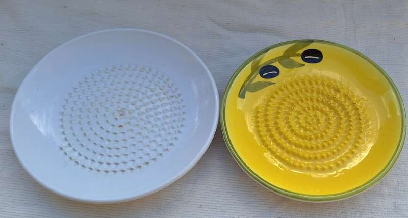 One Porcelain and One Melamine Olive Serving Plates