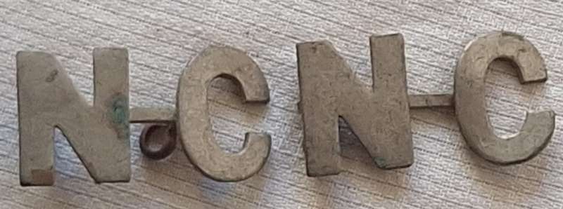 Natal Carbineers White Metal Shoulder Title 1899-1902 with One Lug Missing
