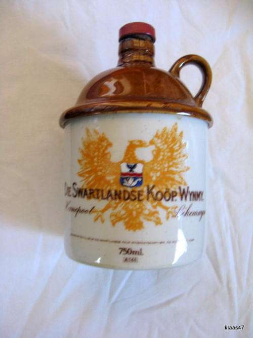 DIE SWARTLANDSE KOOP. WYNMY. : HANEPOOT : EMPTY BOTTLE : 750ML : 17cm HIGH