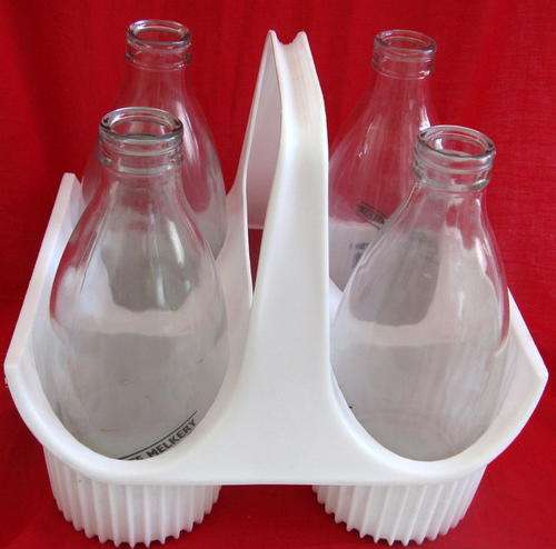 4 GLASS MILK BOTTLES - 1 L : ROODEHOOGTE MELKERY (ROBERTSON) : IN PLASTIC CARRIER