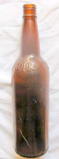 JIK : BROWN GLASS BOTTLE - EMPTY : PROPERTY OF RECKITT & COLEMAN PRODUCTS PTY LTD