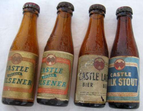 CASTLE BREWERY : 4 MINIATURE BOTTLES : 2XCASTLE PILSENER - 1XCASTLE LAGER - 1XCASTLE MILK STOUT