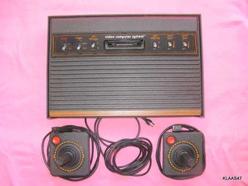 Atari Gaming system Model CX2600 **NOT TESTED**with  CONTROLLERS**