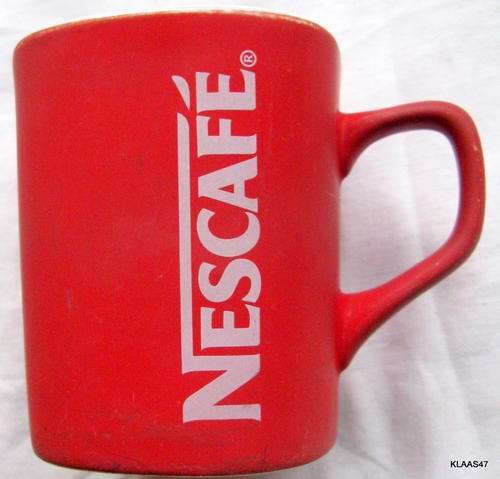 COFFEE MUG : NESCAFE : 9cm HIGH : **PLEASE NOTE - FADED**