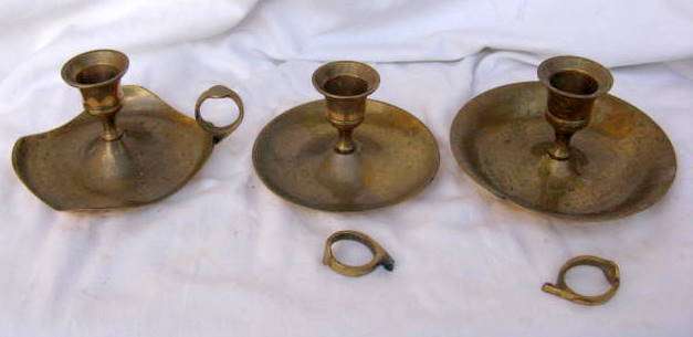 BRASS CANDLE HOLDERS : THREE : TWO NEED HANDLES REPAIRED : DIAMETER10 - 11.5cm