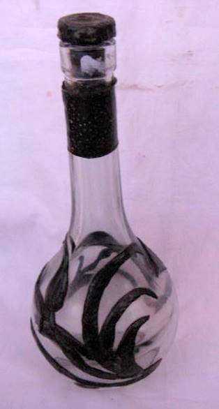 GLASS BOTTLE : 28cm HIGH : METAL "IRIS" DESIGN EMBOSSED : STOPPER ALSO METAL COVERED
