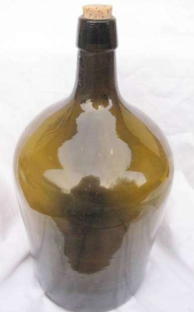 GREEN BOTTLE : HALF DEMIJOHN : 35cm HIGH : BASE DIAMETER 16cm