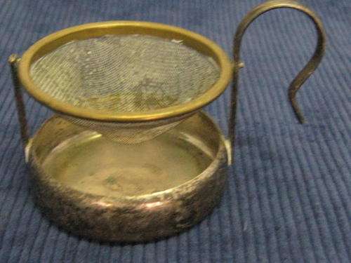 TEA STRAINER ON DRIP STAND : **NOTE - TARNISHED - NOT CLEANED**