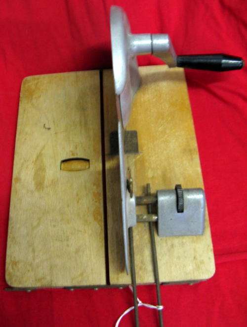 ROTARY BREAD SLICER : ON WOODEN BASE : **PLEASE NOTE THE RUST**