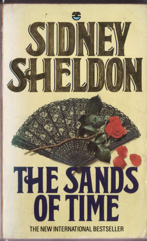 THE SANDS  OF TIME  BY SIDNEY SHELDON  PAPERBACK  BOOK HAS GONE BROWN