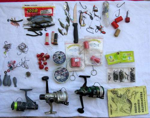 CONTENTS OF FISHING BOX : VARIOUS PIECES : 1 REEL BROKEN : 1 REEL NO HANDLE : **SEE PICTURES**