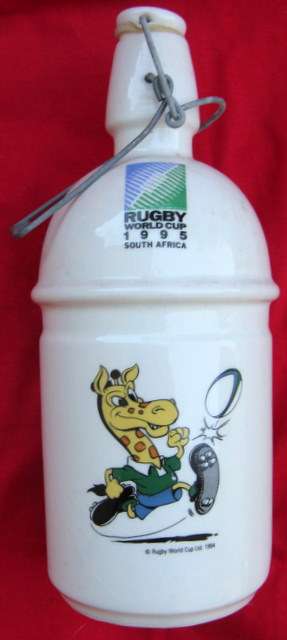 RUGBY WORLD CUP 1995 : PORCELAIN BOTTLE WITH SPRING LID : 25cm HIGH : BASE DIAMETER 9.5cm