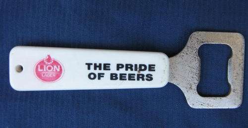 LION LAGER : THE PRIDE OF BEERS : BOTTLE OPENER : PLASTIC HANDLE : 12.3cm LONG