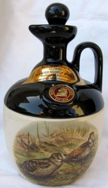 EMPTY BOTTLE : RUTHERFORD'S SCOTCH WHISKY : BASE DIAMETER - 9.5cm : 21cm HIGH