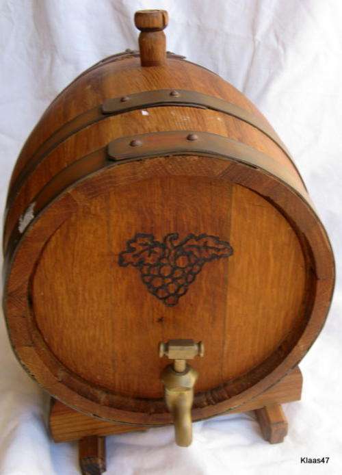 WOODEN BARREL WITH BRASS BANDS AND TAP : ON A STAND : 20cm DIAMETER