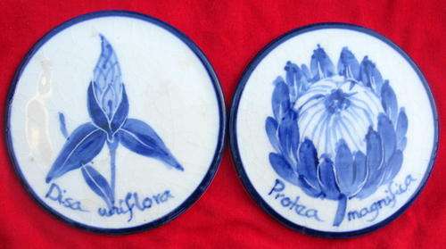2 COASTERS : BLUE & WHITE : DISA & PROTEA : LIESBEEK CAPE TOWN : DIAMETER 9cm