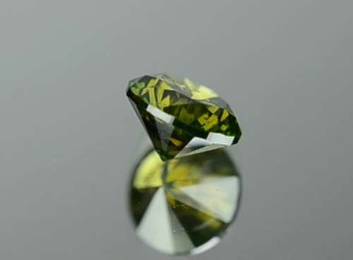 Matching Pair of 1.03tcw Fancy Vivid Green Brilliant Round Cut Natural Diamonds! R72 500