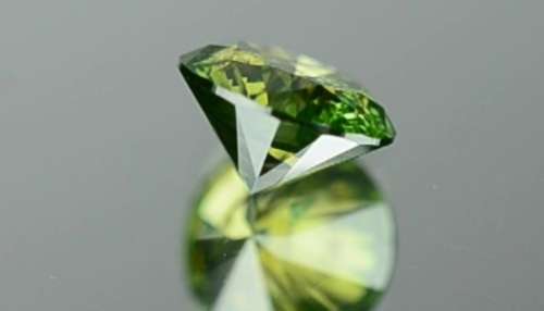Matching Pair of 1.03tcw Fancy Vivid Green Brilliant Round Cut Natural Diamonds! R72 500