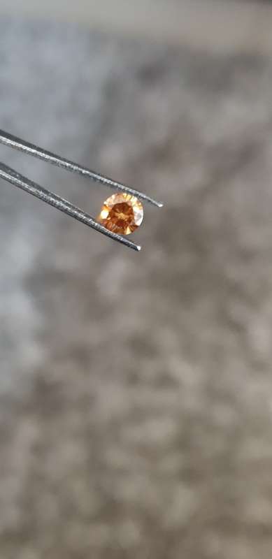 A Superb 0.34ct Natural Round Brilliant Cut Fancy Orange Diamond SI2