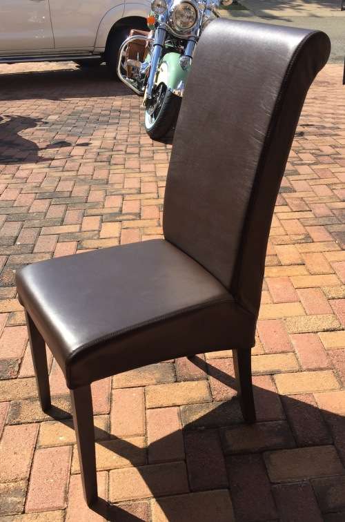 8 Seater Dining Table and Coricraft Leather Chairs