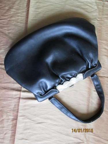 Black handbag, bakelite inlay