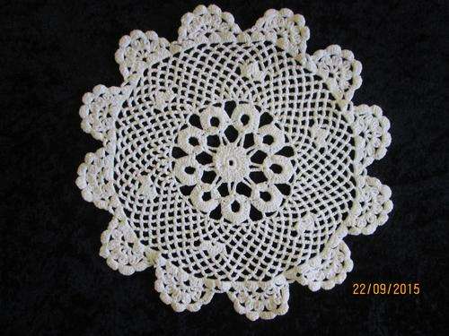 24cm Round White Doillie. small pink stain