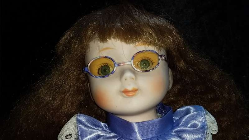 Collectors Doll with Glasses. Purple outfit. -Not Marked