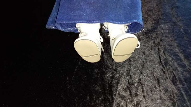 Collectors Doll with Glasses. Purple outfit. -Not Marked