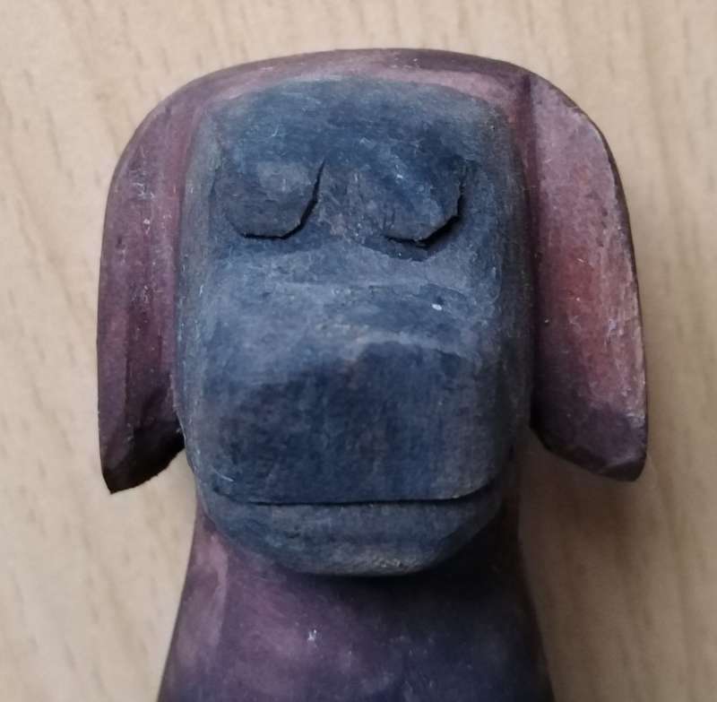 Wood carving of a dog 28cm high