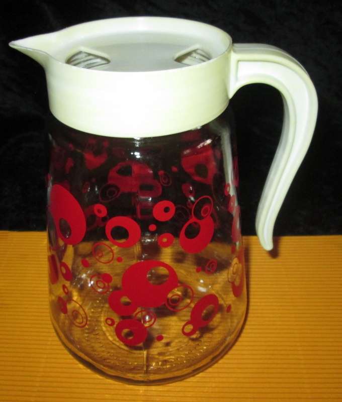 Home & Living-Kitchen ware-Consol Glass Jug with original plastic top. Reto vintage with red circle
