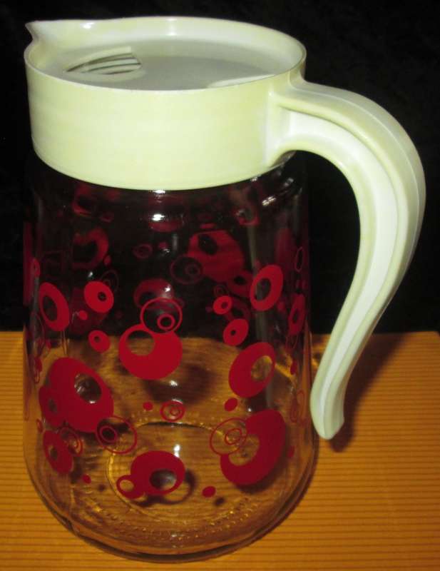 Home & Living-Kitchen ware-Consol Glass Jug with original plastic top. Reto vintage with red circle