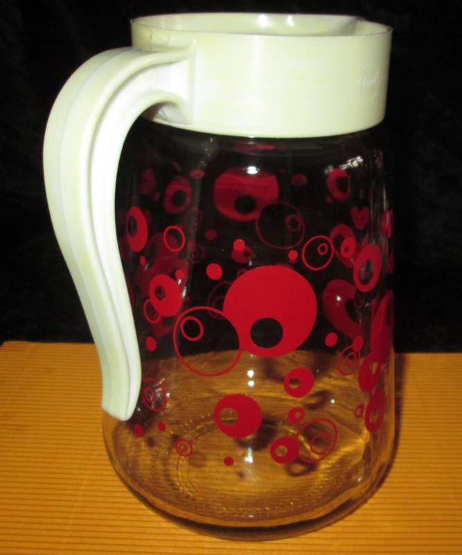 Home & Living-Kitchen ware-Consol Glass Jug with original plastic top. Reto vintage with red circle
