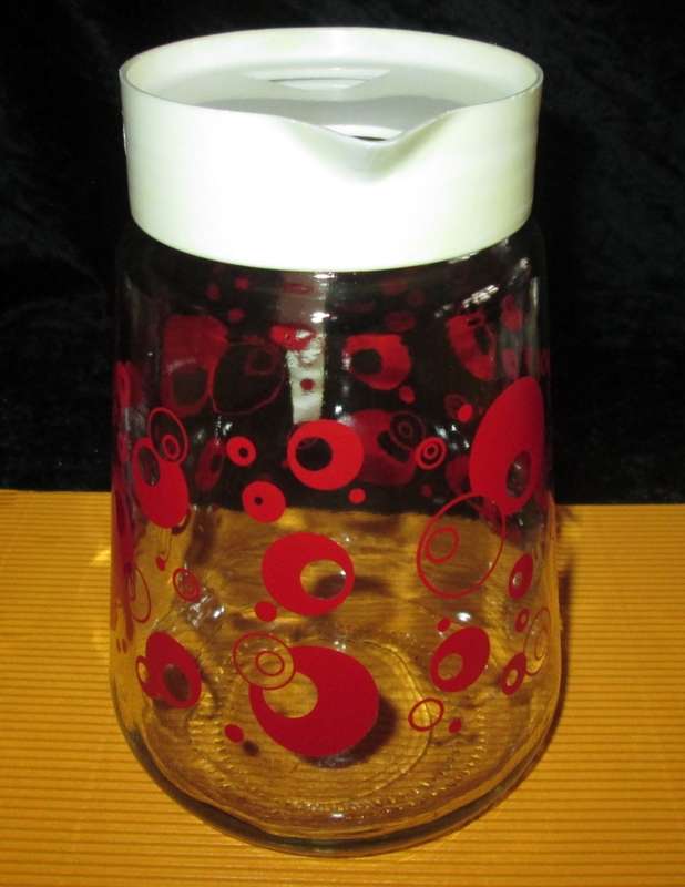 Home & Living-Kitchen ware-Consol Glass Jug with original plastic top. Reto vintage with red circle