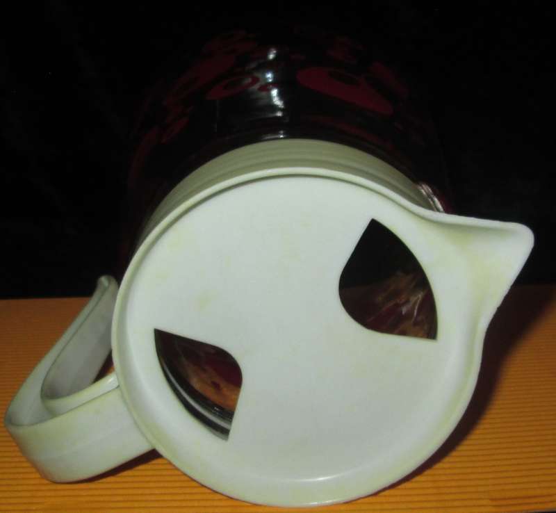 Home & Living-Kitchen ware-Consol Glass Jug with original plastic top. Reto vintage with red circle