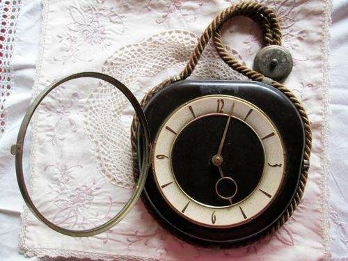 Old wall clock in need of tlc.