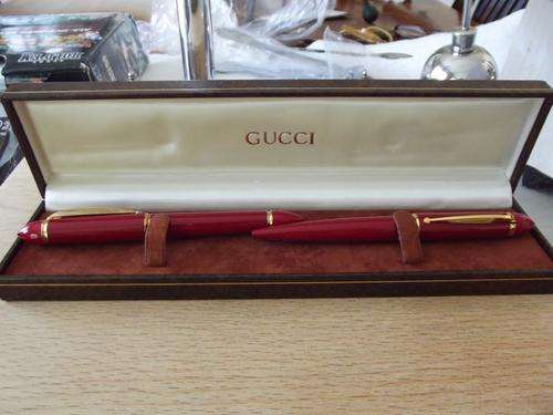 gucci ball point and fountain pen.