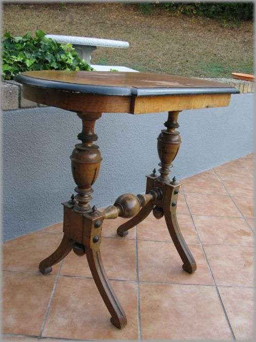 Antique Victorian occassional table. Ornate turned legs and burr walnut top.