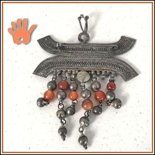 Vintage Yemenite brooch. Filigree with dangling beads.